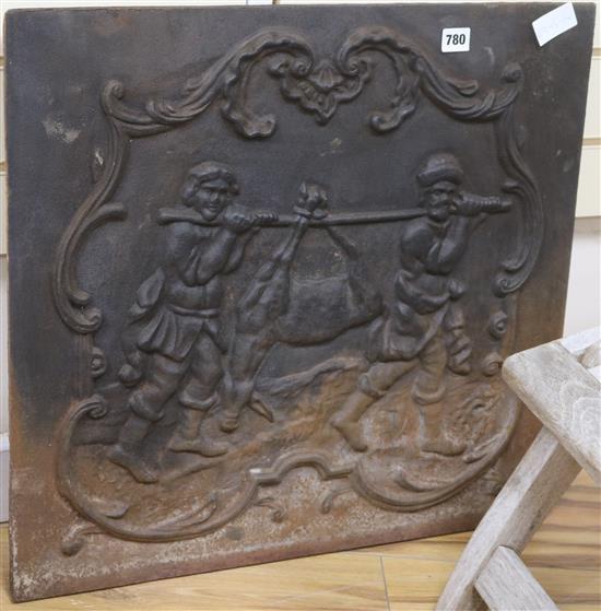 A cast iron fire back W.60cm